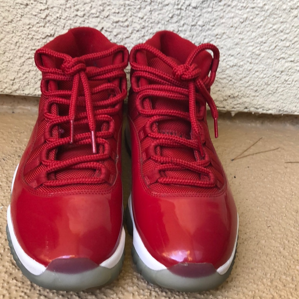 Retro Jordan 11 “win like 96” or “gym reds”